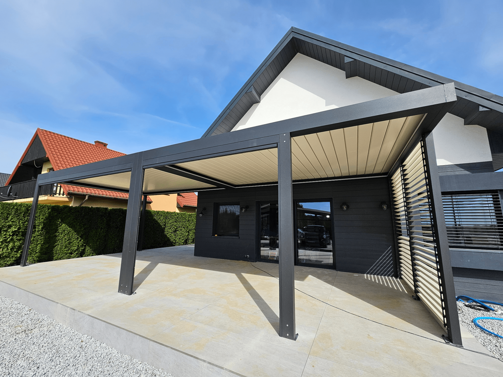 Aluminium terrace pergola with electrically operated slats